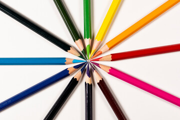 Colour pencils isolated on white background. Macro