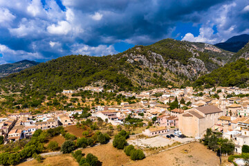 Aerial view, the village of Caimari municipality of Selva on the edge of the Tramuntana mountains with agriculture, center of the island, Mallorca, Balearic Islands, Spain