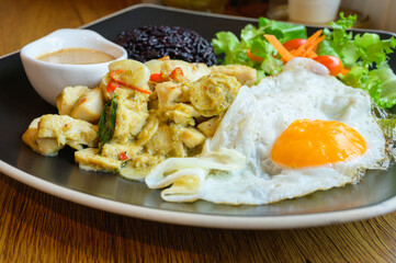 Rice berry and Green Curry With Chicken,fried egg.Clean food and good health for diet concept.