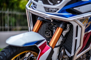 BANGKOK, THAILAND - SEPTEMBER 26, 2020 : Honda Africa Twin Enduro motorcycle model.Close-up front view. - obrazy, fototapety, plakaty