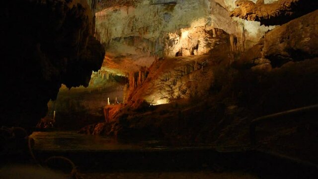 Cave, Underground river, Sail in a boat on an underground river, river in a cave, large cave with an underwater river, staloctites, stalogmites,