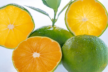 Background photo of tangerines, which are natural sources of vitamin C