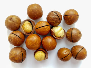 Natural macadamia nut isolated on white background.