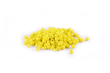 Beads spread on white background. Background or texture of beads. Close up, macro,It is used in finishing fashion clothes. make bead necklace or beads for woman of fashion,Bead Crochet. Daily Beading.