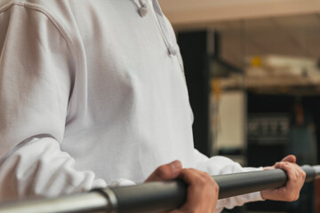 sweatshirt template of guy lifting weight in gym