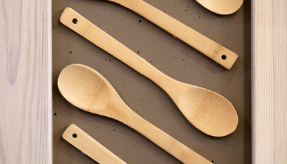 Wooden dishes are shown as interior items for a cafe or restaurant. The concept of food and ecology.