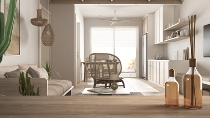 Wooden table top or shelf with aromatic sticks bottles over scandinavian ethnic dining and living room with sofa, armchair, kitchen and big window, architecture interior design