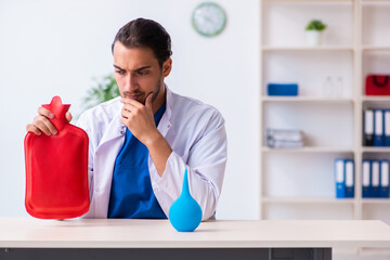 Young male doctor gastroenterologist working in the clinic
