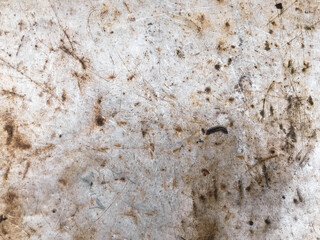 texture, metallic background painted with a bronze tint. the metal sheet is corroded. holes on the metal, damage. on the texture there is corrosion, rust. old house