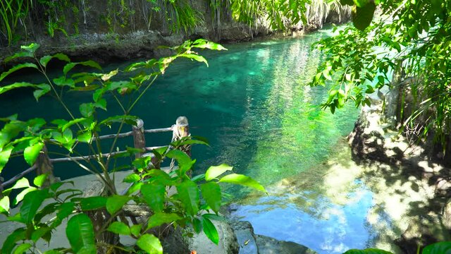 Canyon with a blue lagoon. Enchanted River in Hinatuan, Surigao Del Sur, Philippines.