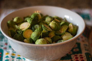 White bowl of brussel sprouts
