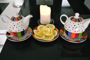 teapot and cups on table
