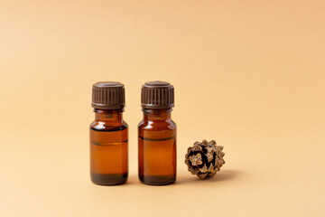 A set of amber bottles for essential oils and cosmetics. Glass bottle. Dropper, spray bottle