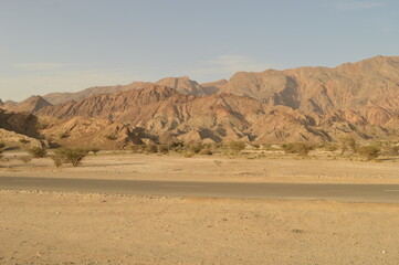 Fototapeta na wymiar The stunning gorges and desert landscape of the Arabian Peninsula in Oman