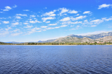 View of the “Santillana” reservoir with the “Guadarrama” mountain range in the background