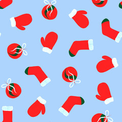 Bright colored Christmas elements and gifts on a blue background - sock, mitten, Christmas ball. Watercolor seamless pattern