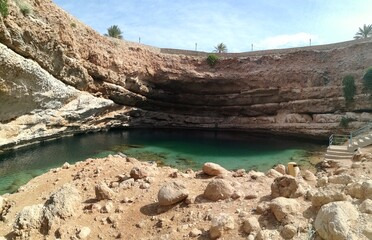 Fototapeta na wymiar The Bimmah Sinkhole and Gorge on the Arabian Peninsula in Oman