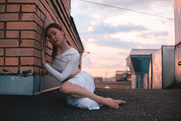 
girl leaning on the wall