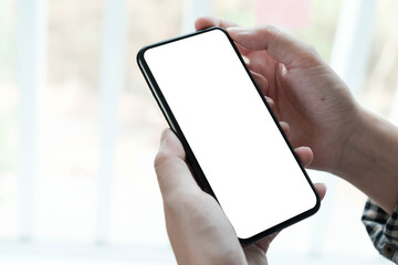 woman using Smartphone. Blank screen mobile phone for graphic display montage.networking service..