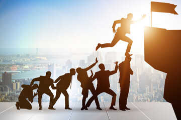 Career progression concept with businessman climbing stairs