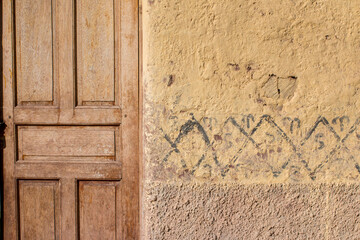 An old door and patterned wall near Cusco, Peru
