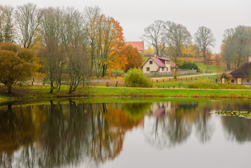 Naklejka na ściany i meble Rural Latvia. Beautiful autumn landscape in Gauja national Park, Sigulda, Latvia