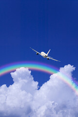 飛行機と入道雲と虹