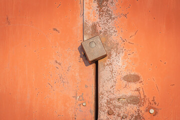 old rusty gates with padlocks