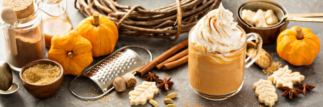 Pumpkin spice latte in a glass mug