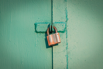 old rusty gates with padlocks