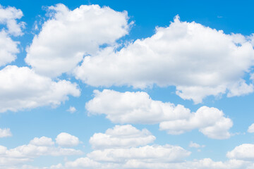 Obraz na płótnie Canvas White big beautiful clouds on the blue sky.