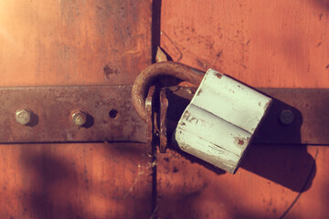 old rusty gates with padlocks