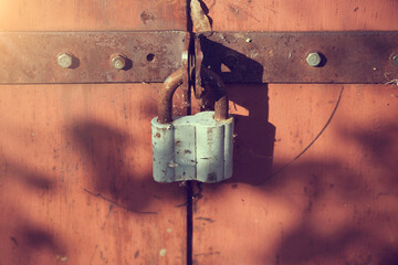 old rusty gates with padlocks