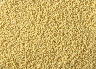 Couscous pile background and texture