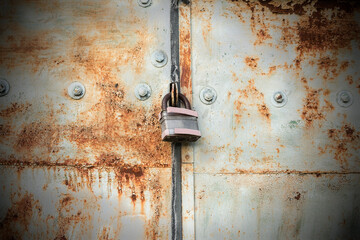 old rusty gates with padlocks