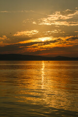 Sunset reflecting on the water of Lake Champlain in Vermont