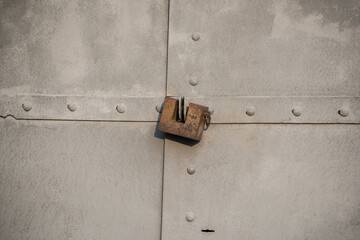 old rusty gates with padlocks