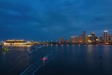 Beautiful colorful city of Miami Florida skyline and bay with night clouds. Miami.