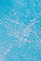 blue surface with white scratches