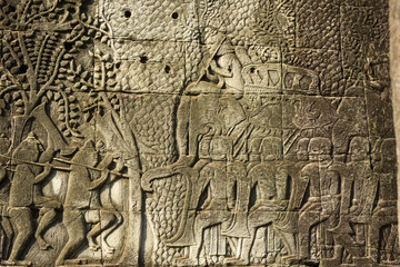 Bas reliefs depicting the battles between Khmer and the Charms, at Bayon temple in Angkor Thom, Siem Reap, Cambodia