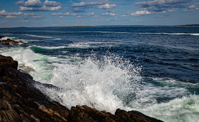 waves crashing on rocks