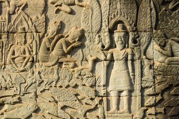 Detail of bas relief depicting worship of king on the Bayon , Angkor Thom, Siem Reap