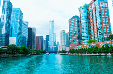 Fototapeta na wymiar Chicago River flowing between city high-rise to Lake Michigan.