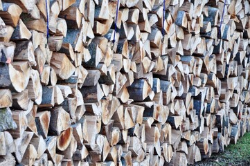 Firewood texture stacked on top of each other. Pile of firewood