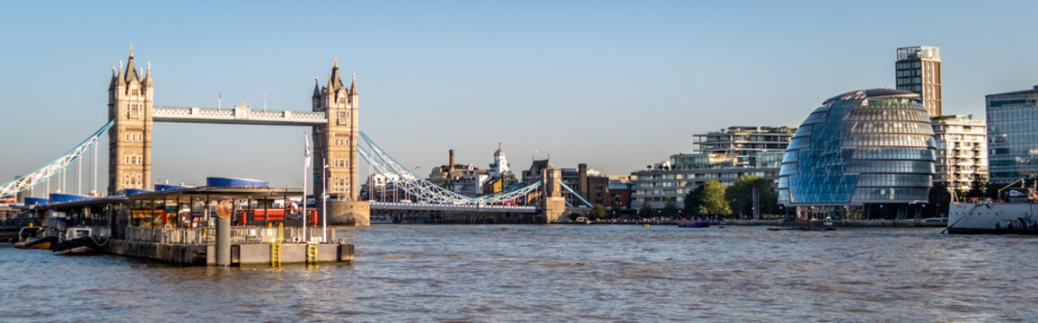 Panoramic View Of The Tower Bridge In Central London During Golden Hour Sunset. Little Traffic Or Commuters On The Bridge During The COVID19 Pandemic Lockdowns