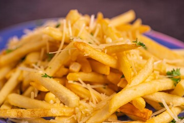 Tasty delicious garlic fries, cooked to a golden brown crisp. 