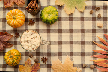 Leaves and pumpkin frame with copy space.