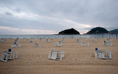 Chairs and sun beds in Ondarreta beach