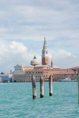 Venice, Basil. of San Marc's cathedral and the tower bell from la Gudecca island, sunny day, Venetian's lagoon