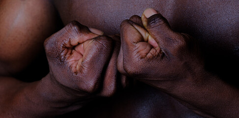 Naklejka premium closeup of the fist of a young black man